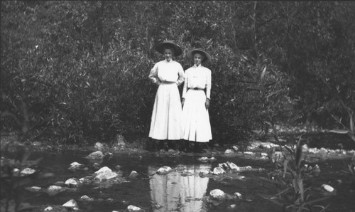 Ella Buer and Minnie Hockemeyer at the Santiago Creek in Orange County Park, Orange, California, 1909