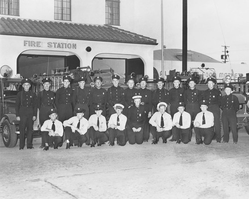 Orange Fire Department group portrait, South Olive Street Fire Station, Orange, California, ca. 1950