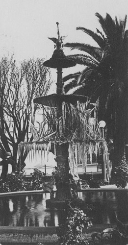 Plaza Park fountain frozen in January, Orange, California, 1913