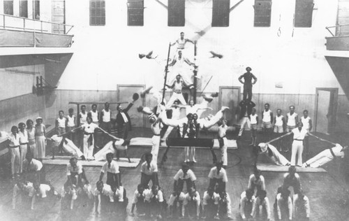 Walker Hall Gymnasium with gymnastic exhibition, St. John's Lutheran Church, Orange, California, 1931