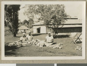 Folding hospital linen, Chogoria, Kenya, ca.1949