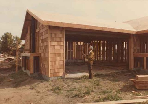 Inspector checking out construction on house