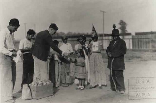 Children receiving awards & candy