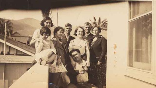 Family picture on upstairs balcony