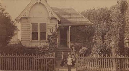 Family in front of house