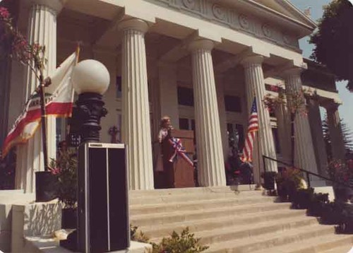 Woman speaking at Cultural Arts Center dedication