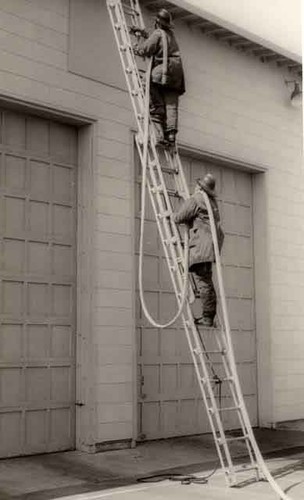 Firemen on ladder