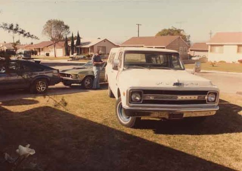 Truck being written up by man