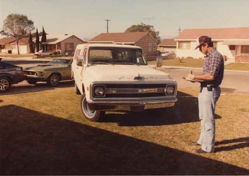 Man writing something about truck