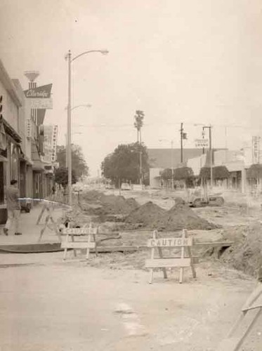 A St. before mall, locating leak in water main