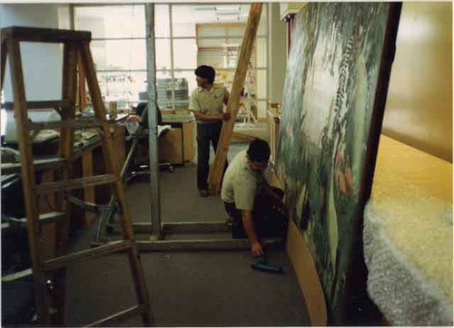 Hanging the mural in the lobby