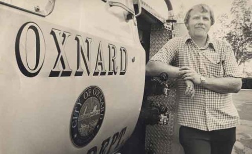 Man standing by City of Oxnard truck