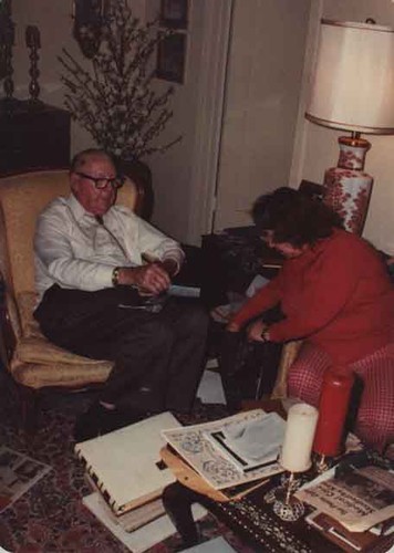 Ed Carty & Rosemarie Harris checking for items