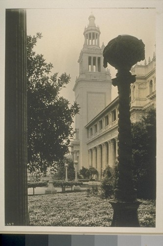 H227. [Light standard; Italian Tower in distance. Court of Flowers (George W. Kelham, architect).]