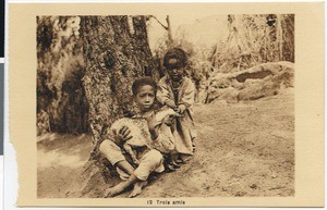 Two Ethiopian children with goatling, Ethiopia
