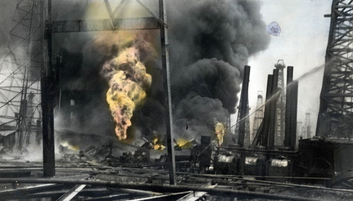 Oil Fire with derricks and equipment, 1929