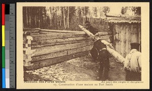 Missionary fathers building a log house, Canada, ca.1920-1940