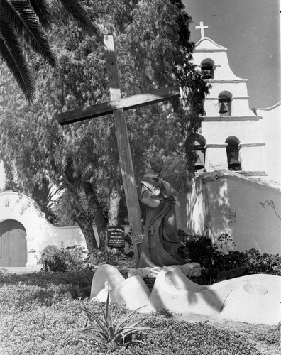 Mission Bell Tower and Cross and Statue at Mission San Diego De Alcala in San Diego County, CA