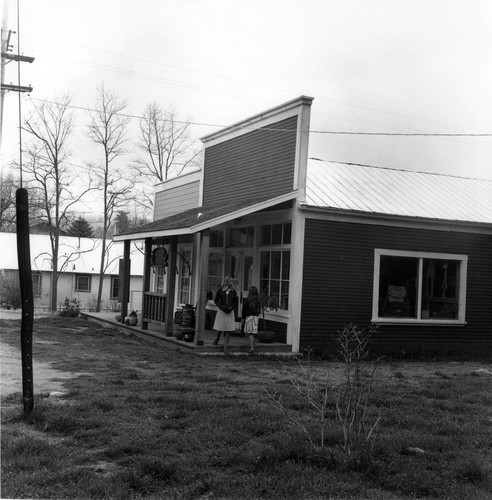 Unidentified false-front building with girls in Julian, CA