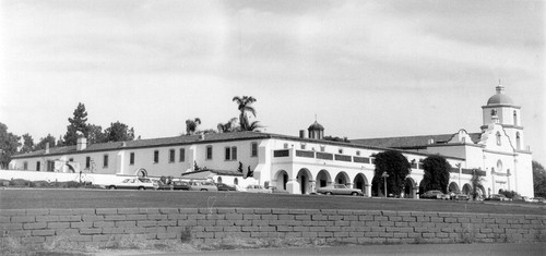 Mission San Luis Rey mission façade and wall from left view in San Diego County, CA