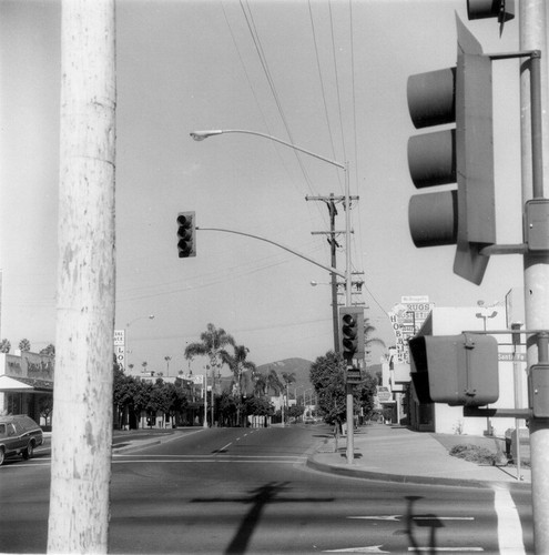 Corner of East Vista Way and Sante Fe Avenue with store signs in Vista, CA