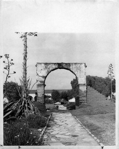 Mission garden and arch at Mission San Luis Rey in San Diego County, CA