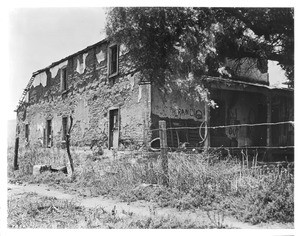 Exterior view of the adobe home of Don Leonard Cota on Rancho Rincon near Ontario, ca.1900