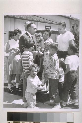 [Governor Edmund G. Brown talking to families in San Bruno during his re-election campaign.]