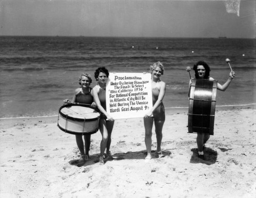 Four women posing on Venice Beach