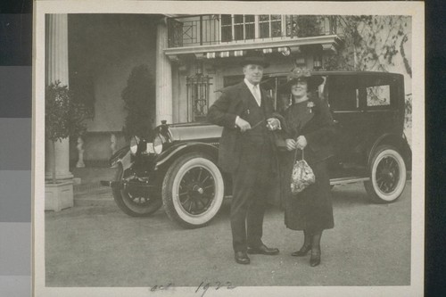 1922 [Man and woman at automobile]