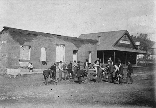 Searching for gold in street, Coulterville