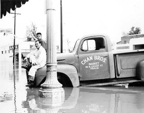 Chan Bros. Market truck in flood of 1955