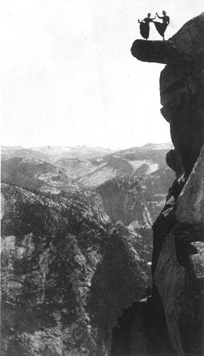 Dancing ladies on overhanging rock