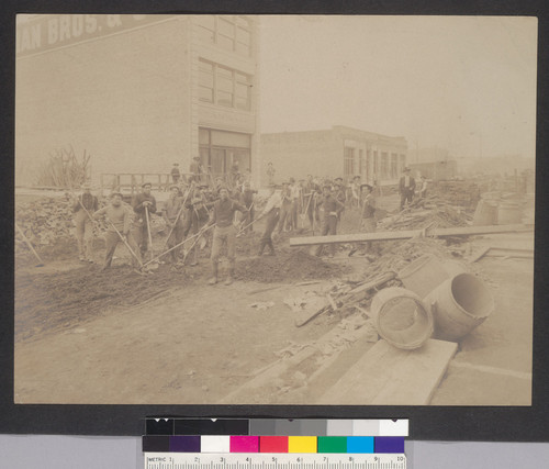 [Group of volunteers cleaning street. San Francisco. House Cleaning Day, March 3, 1907? Photographic print.]