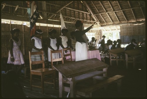 Holy Mama in a church with others