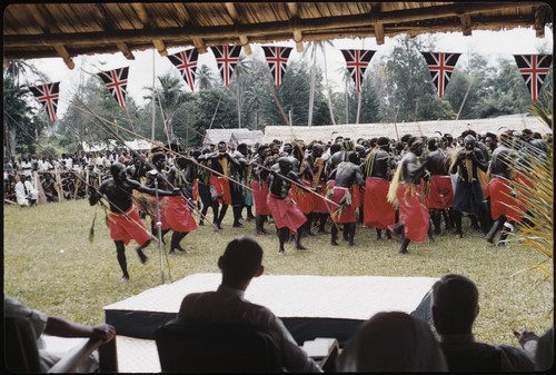 Dancers with spears, and some with bamboo pan pipes