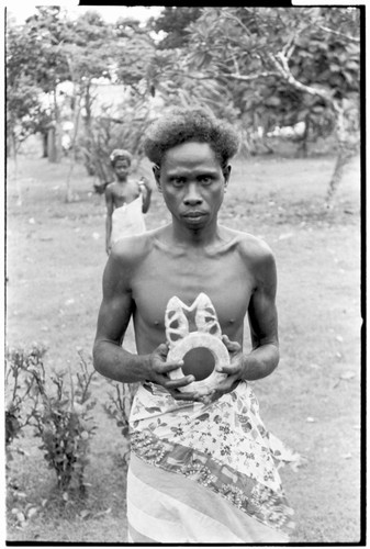 Man with shell valuable