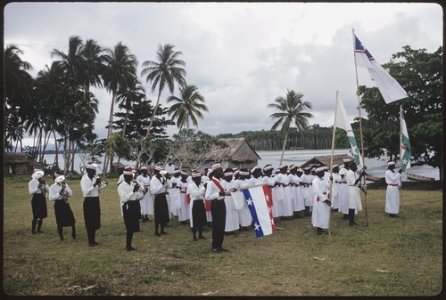 Christian Felowship Church members with flags and music