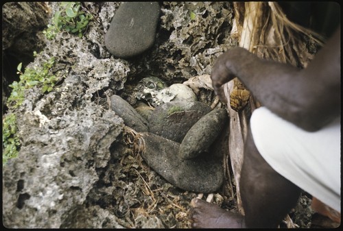 Man on top of skull shrine