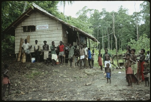 Men and boys in front of a building