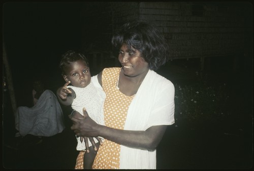 Woman holding child