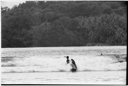 Canoeing in surf