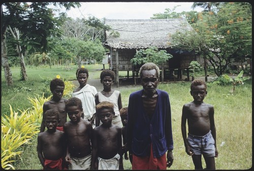 Group portrait of man and boys