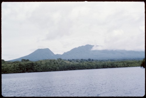 Landscape of the coast and distant mountains