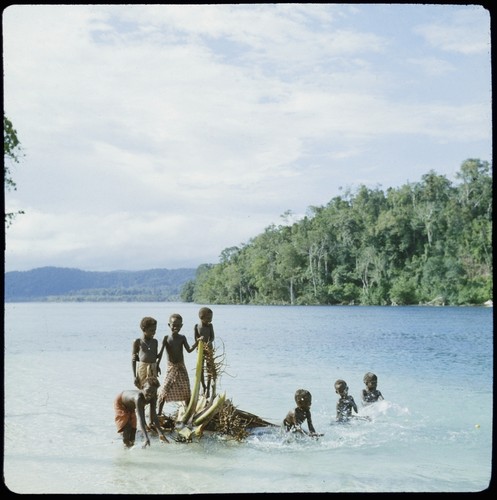 Boys playing on beach