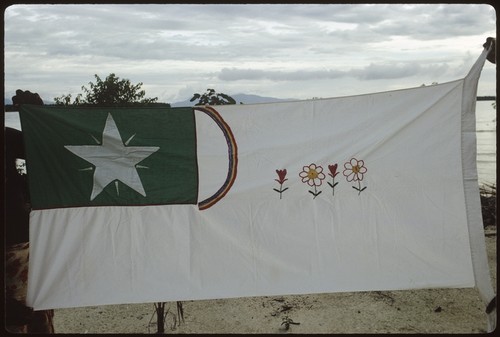 Christian Fellowship Church flag with star, rainbow, flowers