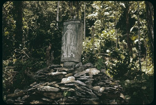 Dolo, or burial urn, chisled from a single block of limestone and set upon a pyramid of coral slab