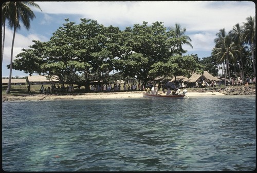 Village, and boat on shore