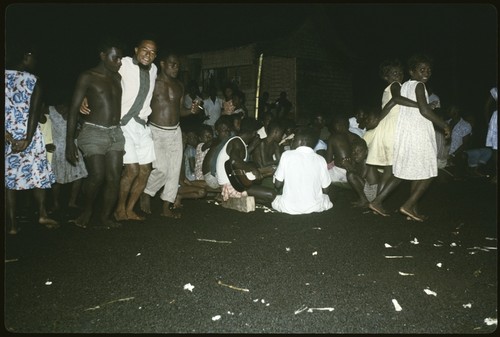 Group at night with musician