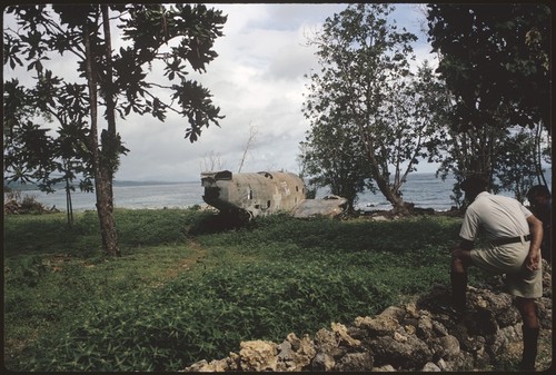 Abandoned airplane, men on the side